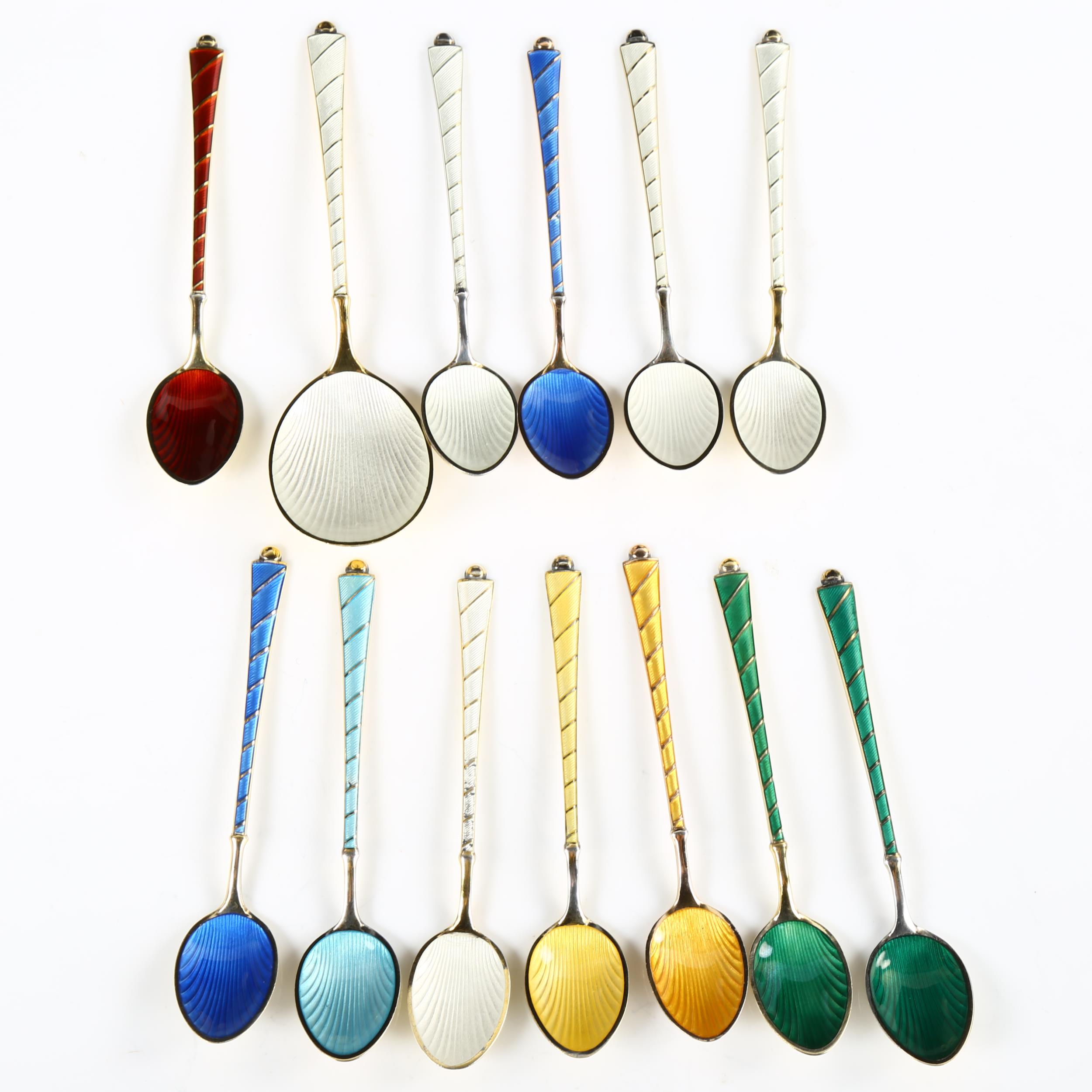 EGON LAURIDSEN - a set of 12 Danish vermeil sterling silver and harlequin enamel coffee spoons and a