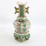 A Chinese famille verte porcelain vase on stand, height 23cm, A/F