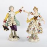 A pair of 19th century German porcelain dancing figures, blue underglaze marks, height 23cm