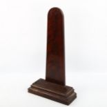 A Chinese hardwood plate stand, 18th or 19th century, with lead-weighted moulded base, 38cm