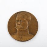A Great War Period Lord Kitchener relief cast bronze medallion, designed by J P Legastelois,
