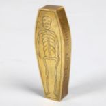 A 19th century brass coffin design snuffbox "Ye Last Snuff", with engraved skeleton to the lid,