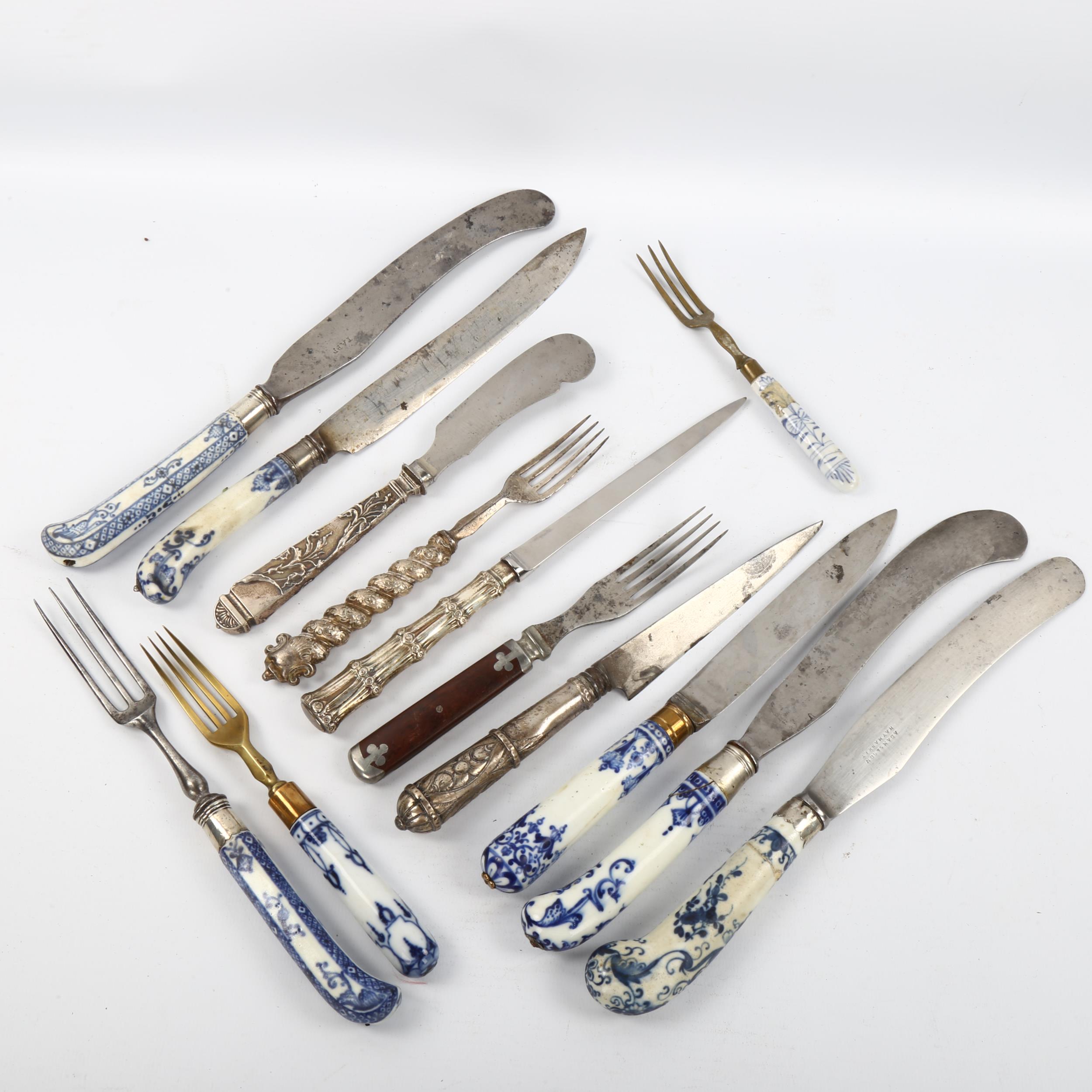 A group of 18th century Meissen blue and white porcelain-handled knives and forks, a silver-