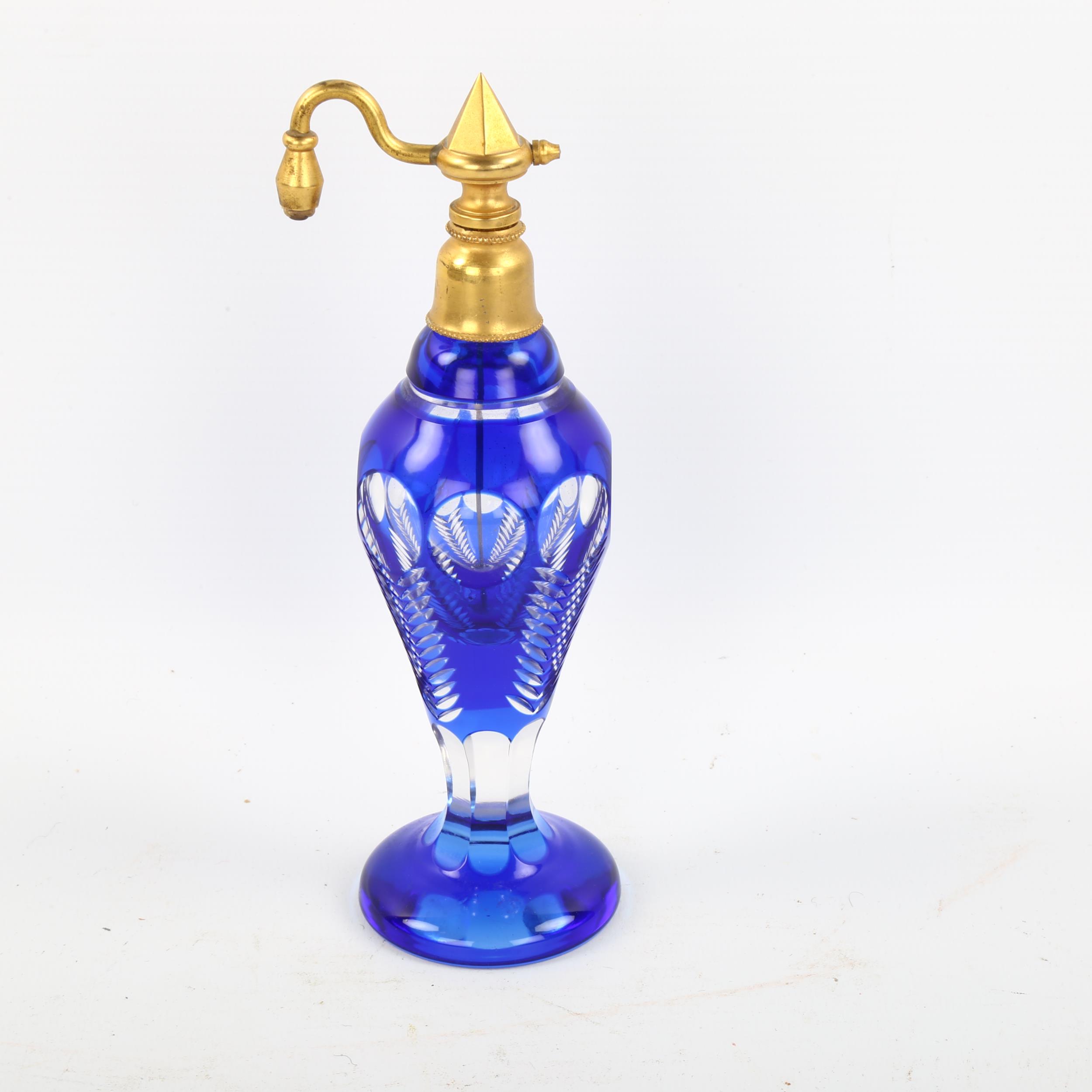 A 19th century Bristol blue overlay glass atomiser perfume bottle, height 18cm