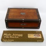 A Chinese bone and bamboo Mahjong set, with racks and instructions in Victorian inlaid box