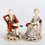 A pair of 19th century porcelain figures of seated children sewing and reading, no factory marks,