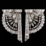 A pair of Art Deco diamond clips, geometric fan form with collet and grain set old and rose-cut