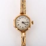 A lady's 9ct gold mechanical bracelet watch, silvered dial with Arabic numerals, blued steel hands