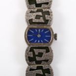 A lady's mid-century silver and enamel bracelet watch, blue enamel dial with white baton hour