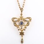 An Edwardian Art Nouveau 9ct gold sapphire and pearl floral pendant necklace/brooch, on 9ct rose