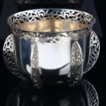 A heavy Victorian silver rocket table centre bowl, with flared rim and pierced foliate gallery