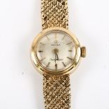 OMEGA - a lady's 9ct gold Ladymatic automatic bracelet watch, circa 1966, silvered dial with gilt