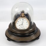 An ebonised wood dome-top pocket watch stand, with gold plated Record Dreadnought pocket watch,