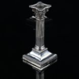 An Edwardian silver Corinthian column table candlestick, with removeable sconce, by Goldsmiths &