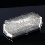 A large Russian 84 zolotnik standard silver cigarette case, engraved St Petersburg view lid and