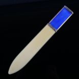 A Scandinavian silver and blue enamel paper knife, with ivorine blade, overall length 19.5cm