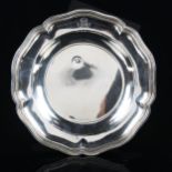 A French silver serving plate, scalloped reeded rim, Minerva head mark, maker's mark indistinct,