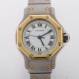 CARTIER - a lady's bi-metal Santos Octagon automatic bracelet watch, white dial with Roman numeral