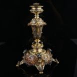 An Austrian 800 silver-gilt tazza base, ornate repousse foliate and fruit swag decoration, with