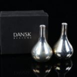QUISTGAARD for DANSK DESIGNS - a pair of Danish silver plated leaning onion candle taper stick