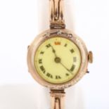 A First World War Period 9ct rose gold mechanical bracelet watch, white enamel dial with Arabic