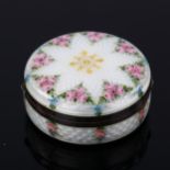 A Swedish silver and enamel circular box, hand painted rose and pansy decoration with guilloche
