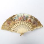 A 19th century French bone fan, with hand painted paper screen depicting musicians by a fountain,