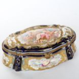 Mid-19th century Sevres porcelain ormolu mounted box of oval form, hand painted panels in relief