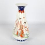 A Japanese porcelain vase of tapered form, with hand painted figures and elephant handles, height