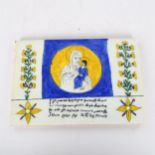 An Armenian pottery tile with hand painted religious design, 16.5cm x 24cm Glaze is slightly