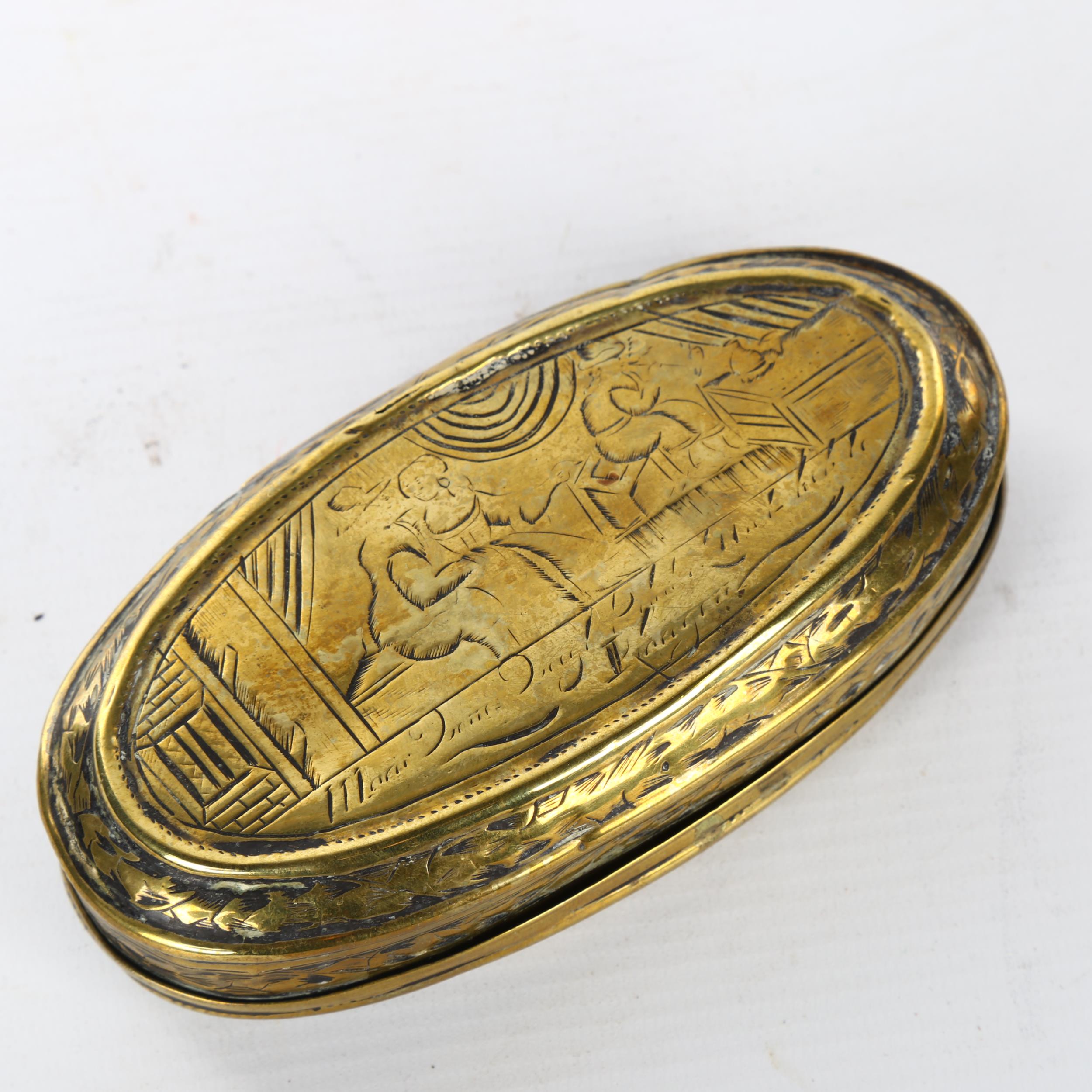 An 18th century Dutch engraved brass tobacco box, length 13.5cm Hinge has an old repair, - Image 2 of 3