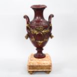 Parcel-gilt patinated bronze urn on marble base with ormolu mounts, height 41cm Good condition