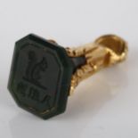 A small Victorian bloodstone seal fob, intaglio carved with squirrel emblem and initials below, in