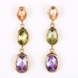 A pair of gem set drop earrings, unmarked yellow metal settings with citrine peridot and amethysts