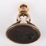 An Antique hardstone ring stone, intaglio carved depicting Aristotle, in unmarked gold fob mount,