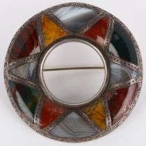 A 19th century Scottish hardstone brooch, unmarked silver closed-back settings in circular form,
