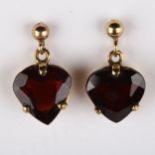 A pair of mid-20th century 9ct gold garnet heart earrings, set with heart-cut garnets and stud