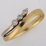 An 18ct two-colour gold three stone diamond band ring, set with modern round brilliant-cut diamonds,