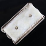 A Navajo silver and hardstone belt buckle, length 65mm, 84g No damage or repairs, only light surface