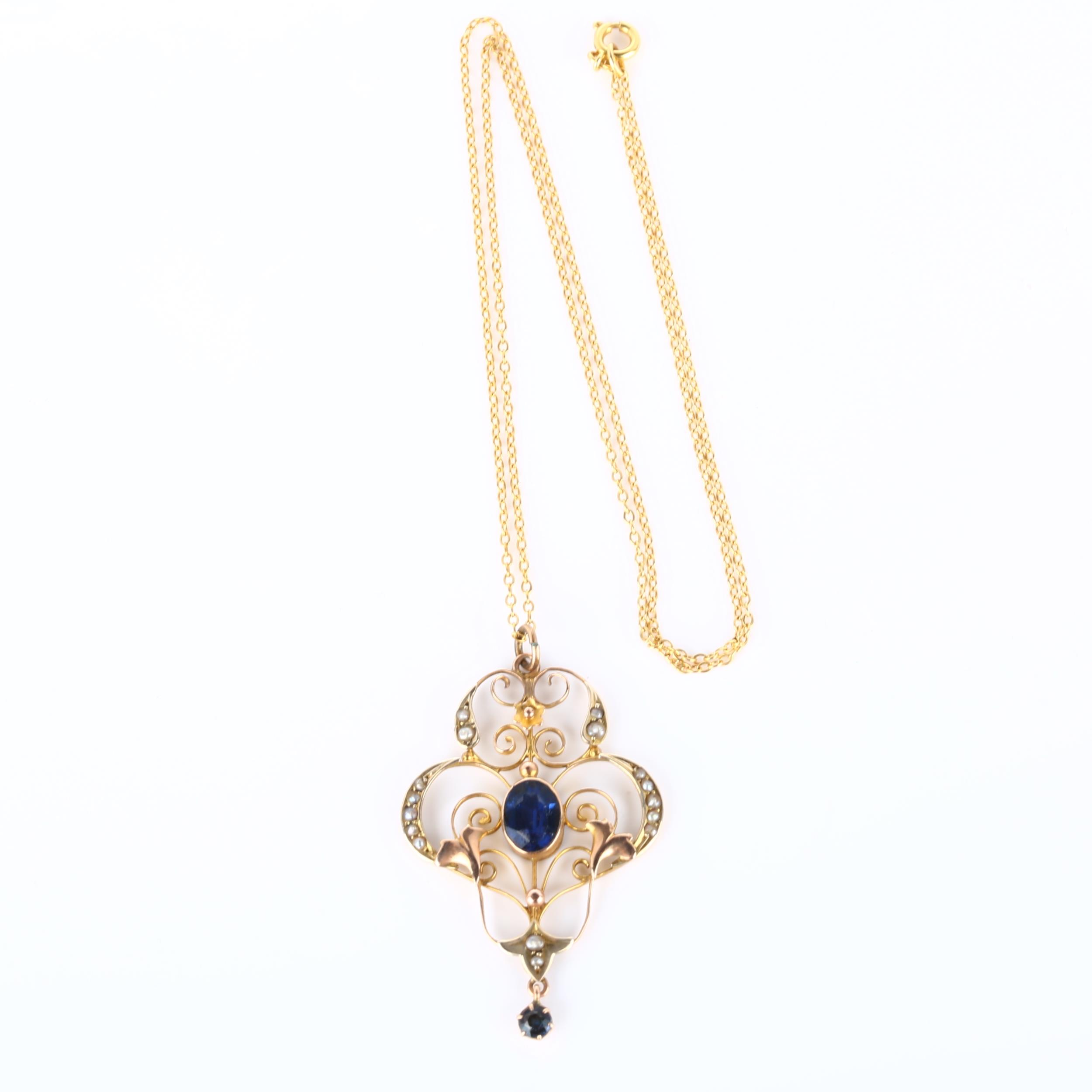 An Edwardian Art Nouveau 9ct gold stone set openwork pendant necklace, set with oval mixed-cut - Image 4 of 4