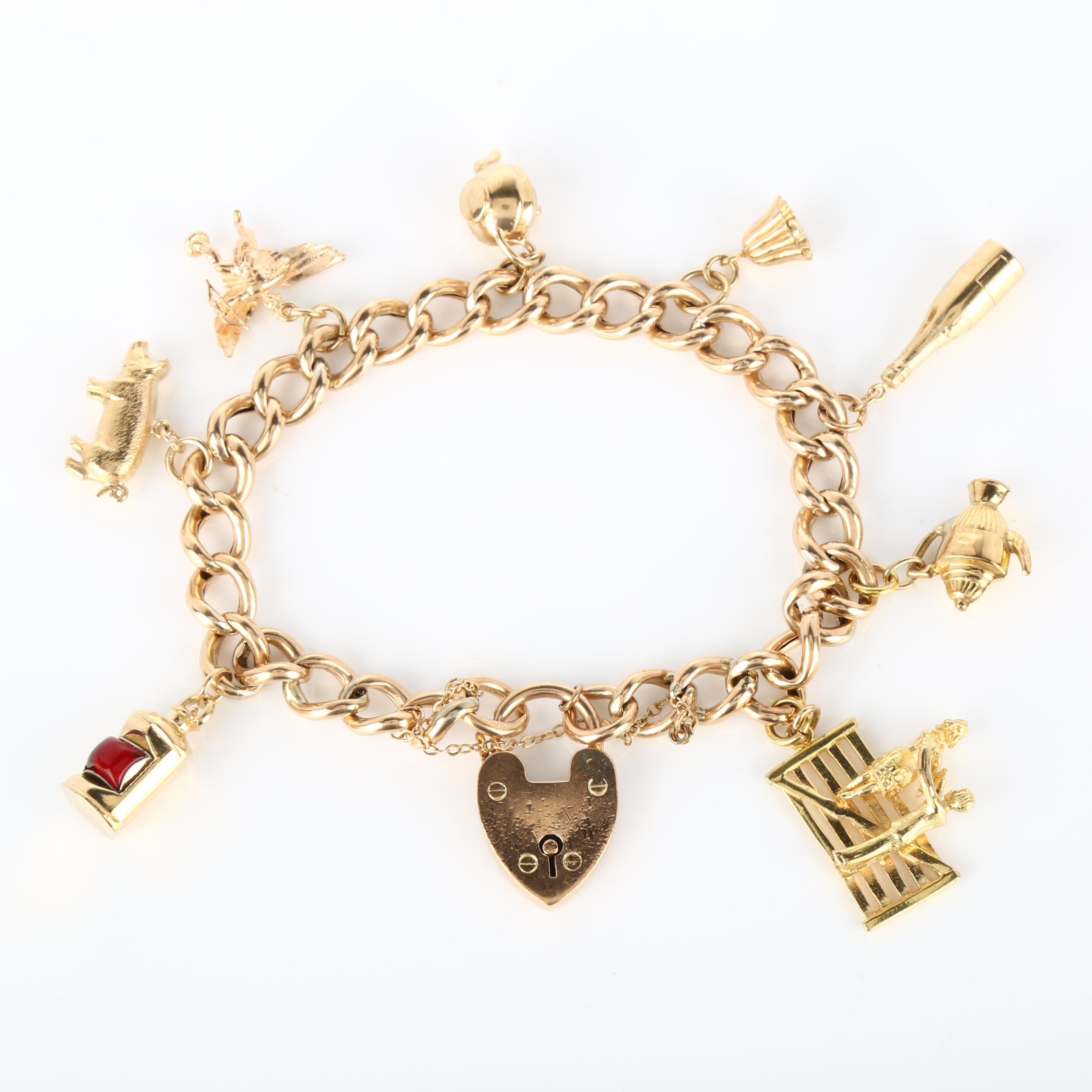 A mid-20th century 9ct gold hollow curb link charm bracelet, with 8 gold charms and heart padlock