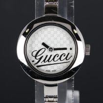 GUCCI - a lady's stainless steel quartz bracelet watch, ref. 105, Gucci GG monogram dial with bangle