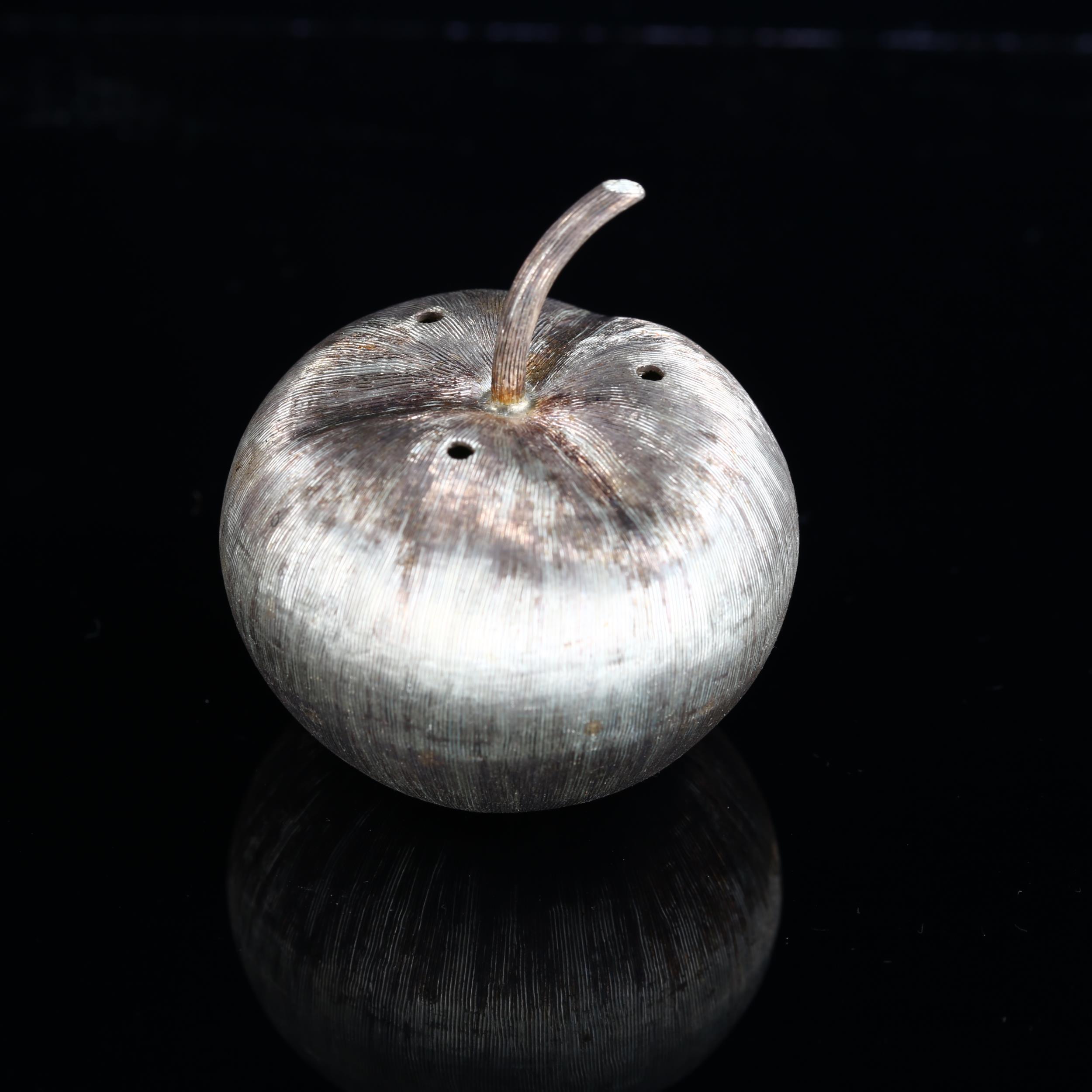 A mid-century Continental sterling silver novelty apple pepperette, textured decoration, with
