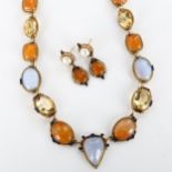 PERCOSSI PAPI - a silver-gilt stone set matching necklace and earring set, gemstones include blue