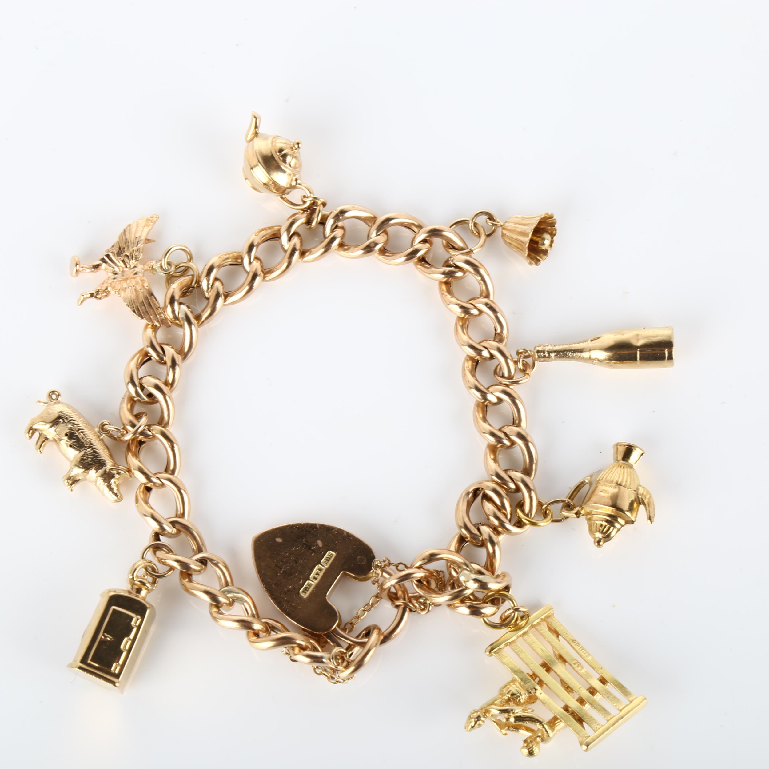 A mid-20th century 9ct gold hollow curb link charm bracelet, with 8 gold charms and heart padlock - Image 4 of 4