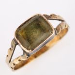 A Victorian foil-backed quartz dress ring, unmarked gold closed-back settings with cushion-cut