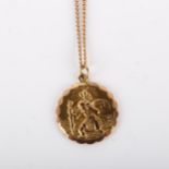 A late 20th century 9ct gold St Christopher pendant necklace, on 9ct fine flat curb link chain, by