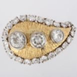 WILLIAM RUSER - a platinum gold and diamond tear-drop cocktail ring, the textured tear-drop panel