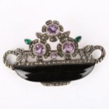A large Art Deco style silver onyx amethyst and marcasite basket of flowers brooch, brooch length