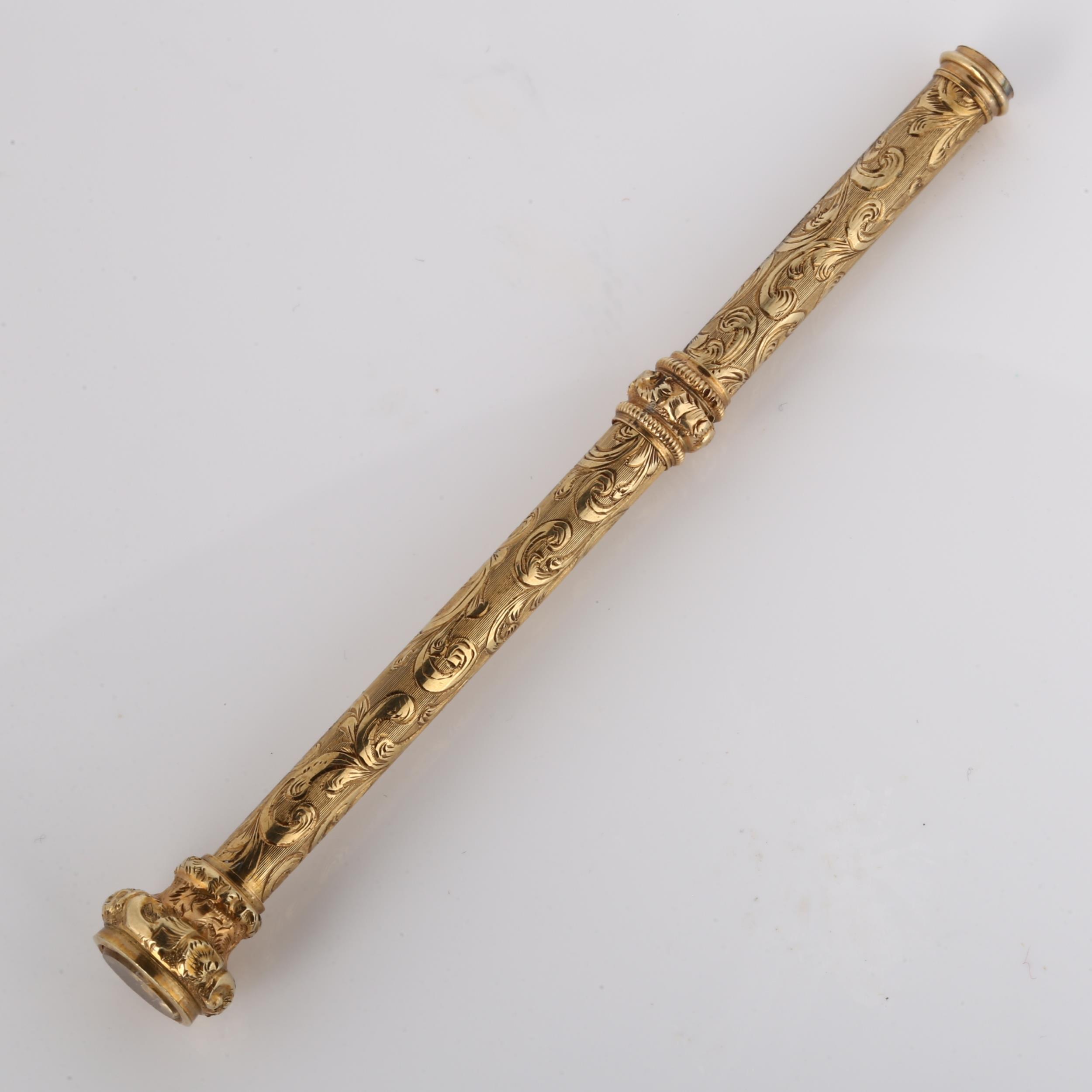 A 19th century propelling pencil, unmarked yellow metal settings with engraved foliate decoration - Bild 3 aus 4